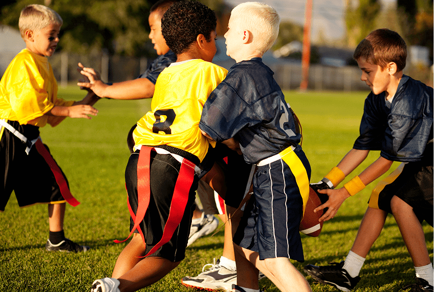 Young boys in a flag football game